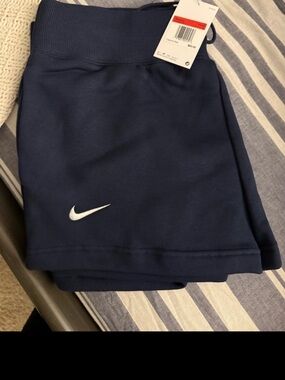 Nike Navy Blue Athletic Shorts with White Swoosh